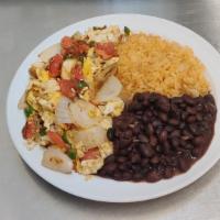 Huevos A La Mexicana · 2 eggs, scrambled with tomatoes, onion, and peppers along side rice and beans.