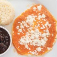 Huevos Rancheros · 2 sunny side up eggs toped with tomatillo sauce. With side of beans and rice.