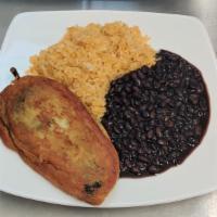 Chile Relleno · Pepper stuffed with cheese and breaded with egg whites, and a side of beans and rice.