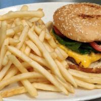 Hamburger · Beef patty, thousand island, lettuce, tomato and a side of fries with a free drink.