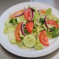 House Salad · Lettuce, tomatoes, cucumber, and onions. Choice of home made Italian Vinaigrette, Ranch, or ...