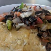 Veggie Omelette · Tomato, bell pepper, onion and mushroom. Served with choice of hash browns or country fried ...