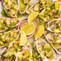 Ostion Supremo · 12 pieces of oysters ,tanned shrimp on lime juice mixed with aguachile sauce and pico de gal...