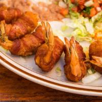 Camarones Costa Azul · Shrimp wrapped in bacon.