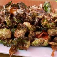 Bacon Brussels Sprouts · Fried brussels sprouts, applewood smoked bacon, balsamic glaze, topped with parmesan cheese