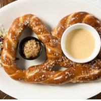 Giant Pretzel & Guinness Cheese · Served with a side of Guinness Mustard.