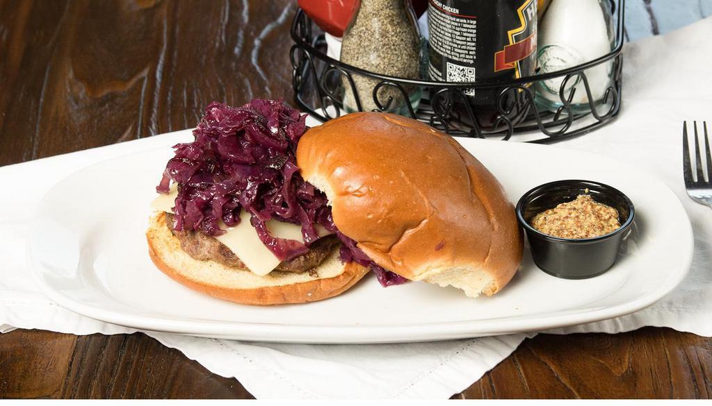 Hooleys Half & Half · Ground corned beef & ground beef patty, topped with swiss & bacon-braised red cabbage. Served with a side of Guinness Mustard.