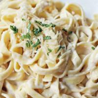 Alfredo Pasta · Made to order. Homemade alfredo sauce over fettuccine pasta with butter & cream, tossed with...
