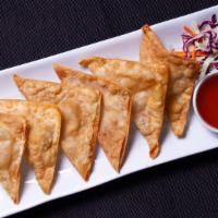 * Cream Cheese Wonton * · Spicy. Handmade lightly golden fried wontons stuffed with cream cheese and water chestnuts s...