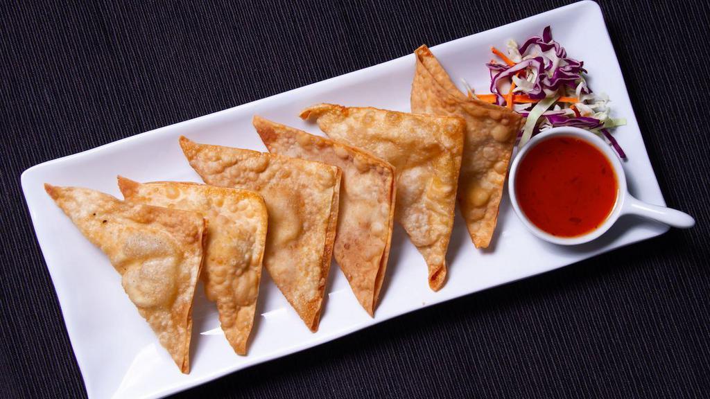 * Cream Cheese Wonton * · Spicy. Handmade lightly golden fried wontons stuffed with cream cheese and water chestnuts served with our delicious sweet chili sauce.