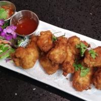 * Chicken Wings * · Spicy. Deep-fried marinated chicken wings served with our delicious sweet chili sauce and ja...