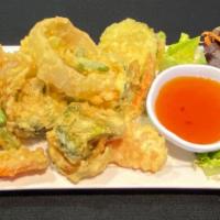 * Vegetable Tempura * · Spicy. Deep fried mixed vegetables (green beans, carrots, broccoli, onions, zucchini) served...