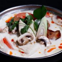 * Tom Kha (Coconut Milk Soup) * · Spicy. Gluten free. Coconut lemongrass soup with mushrooms and topped with Galangal & Cilant...