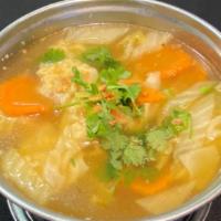 * Wonton Soup * · Spicy. Gluten free. Wontons stuffed with ground shrimp and pork, Napa cabbage, and cilantro.