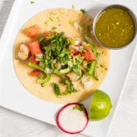 Shrimp Taco · Grilled shirmp served on a soft 6in tortilla topped with grilled onion, bell papper and pico...