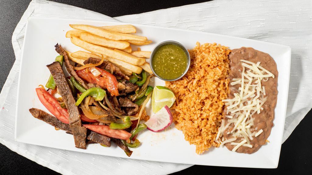 Asada Fajitas · Asada grilled and diced with grilled onion and bell pepper and your choice of flour or corn tortillas