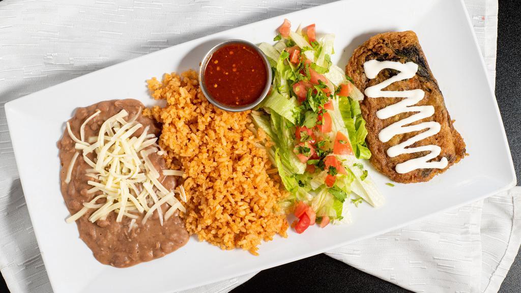 Chile Relleno Plate · Poblano Pepper stuffed with Monterey cheese dipped in light egg batter.