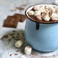 Sweets Hot Chocolate · Chocolate, milk, creamy milk, torched marshmallow, cocoa powder