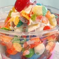 🦄   Unicorn Sundae · 1 scoop of Strawberry ice cream, cupcake bites, skittles, gummy candy, marshmallow, strawber...