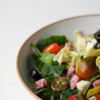 Antipasto · Mixed greens, salami, mozzarella, artichoke hearts, cherry peppers, pepperoncini, black oliv...