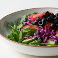 Farm Salad · Mixed greens, red cabbage, black olives, cherry tomatoes, cucumbers, herb ranch dressing.