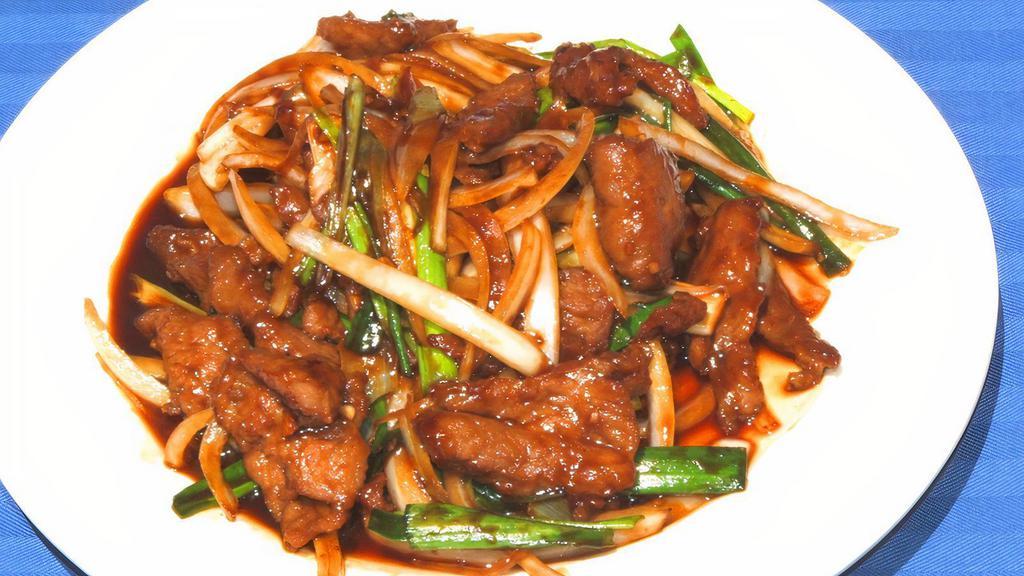 Mongolian Beef · Served with one egg roll one fried jumbo shrimp fried or steamed rice.