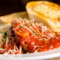 Chicken Parmesan · Tender chicken breast on a bed of fettuccine smothered with provolone cheese and our home-ma...