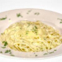 Fettucini Alfredo · Add chicken for an additional charge.