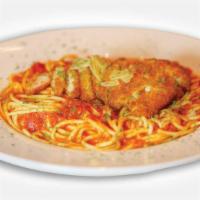 Chicken Parmesan · With spaghetti.