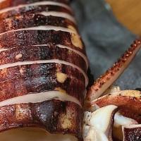 Charcoal Grilled Whole Squid · Grilled squid served with Japanese mayo