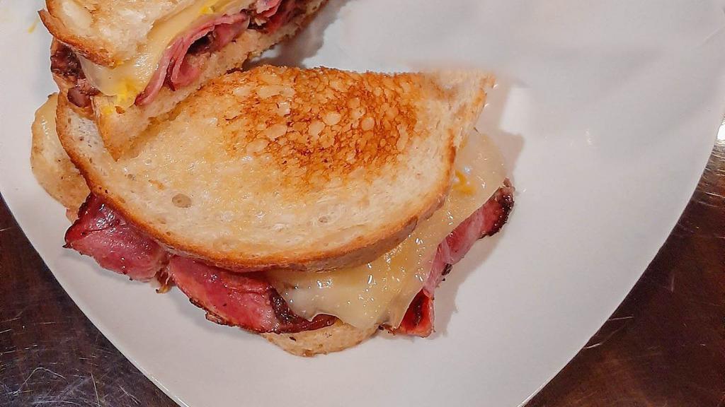 Pastrami · Swiss cheese, dill pickle, mustard, sourdough.