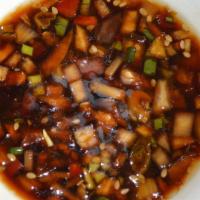 Rei Do Gado Dressing · Vegetarian. Chopped green onion, bell pepper, garlic, sesame seeds in soy sauce and sesame o...