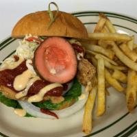 Hot Chicken Sandwich · Fried chicken coated with out hot chicken sauce, chipotle mayo, lettuce, tomato, and colesla...