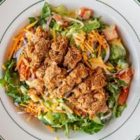 Fried Chicken Salad · Fried chicken thighs, salad mix, tomatoes, cheese, red onion and honey mustard.