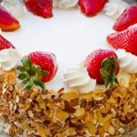 10’’ Round Strawberry Shortcake · Serves ten to thirteen people. White cake filled with fresh, glazed strawberries and whip cr...