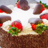 10’’ Round Chocolate Cake · Serves ten to thirteen people. Chocolate cake filled with fresh strawberries and chocolate m...