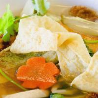 Vegetable Soup With Tofu · Rice noodle, mix seasonal veggie, tofu, mushroom comes with fresh bean sprout).
