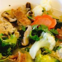 Mushroom Soup · Thin vermicelli, mushroom, bean thread, daikon, carrot comes with fresh cabbage.