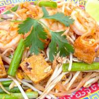 Pad Thai  · Rice noodle, egg, shrimp, tofu, sweet radish, red onion, green onion, bean sprout, crushed p...