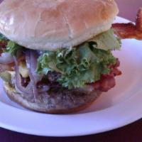 Big Daddy Burger · Get ready for two 1/4 lb. patties with Swiss and American cheese, pastrami, smoked bacon, ma...