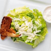 Caesar Salad · Grilled or Cajun chicken with Parmesan cheese, croutons, and creamy Caesar dressing.
