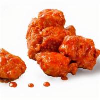 Boneless Wings (5) · Hand breaded and cooked to order, served with dressing of your choice.