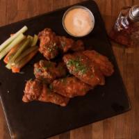 Wings  · Our famous twice-fried wings served with various dipping sauces on the side.

If you dare, c...