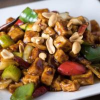 C#9. Kung Pao Chicken · Spicy. Diced chicken sautéed with carrots, celery, green peppers and peanuts in spicy kung p...