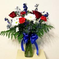 Red, White & Blue  Arrangements · All-around arrangement with red roses, white Daisy Poms, Chrysanthemum, Carnation and blue d...
