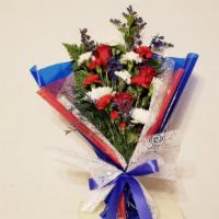 Honor A Hero Bouquet · Celebrate American pride with our patriotic bouquet. Highlighted by blue ribbon and red, whi...