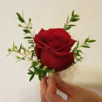 Red Rose Boutonniere With White Ribbon   · Red rose and greenery boutonnieres with White ribbon.   
***Add Special Instructions if you ...