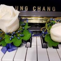 White Rose  Wrist Corsage & Boutonniere · Set of white roses, berries and greenery corsage and boutonniere with blue ribbon.

***Add S...