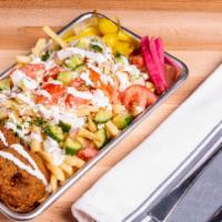 Falafel Cart Fries · Crispy french fries with falafel, chopped garlic, tomato, onion, cucumber, spicy peppers, ga...