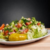 Mediterranean Salad (Vegan) · Chopped lettuce, tomato, cucumber, radish, onion, parsley tossed in lemon juice, olive oil, ...